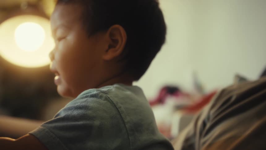 Children point at something with their father