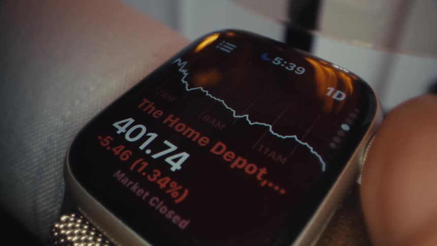 A person adjusts the information displayed on their smart watch