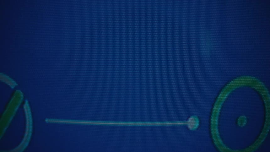 A fingerprint is scanned on a screen and a check mark appears