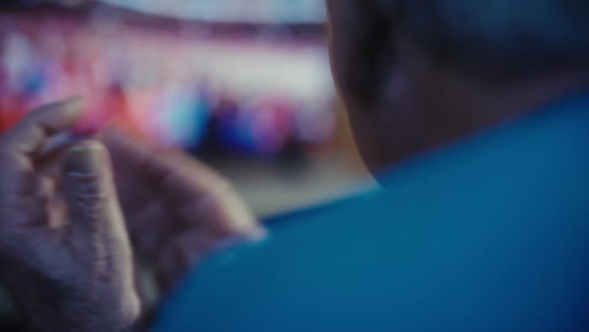 Elderly man clapping