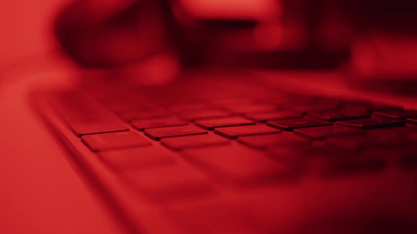 Red light is shining on the keyboard
