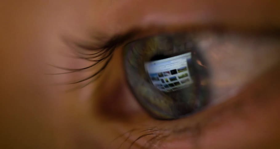 Reflection of a screen displayed in a persons eye