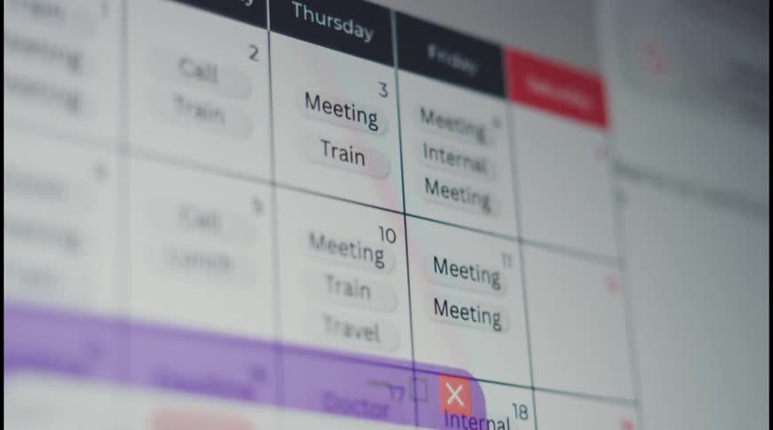 Computer screen shows a schedule with a task list about training and leadership