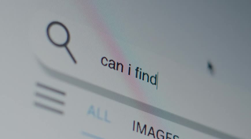 A person types in a search bar