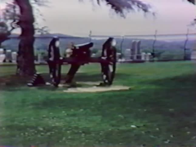 A large cannon sits on a field