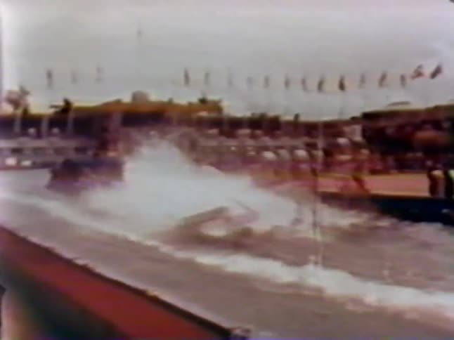 People are water skiing behind a boat