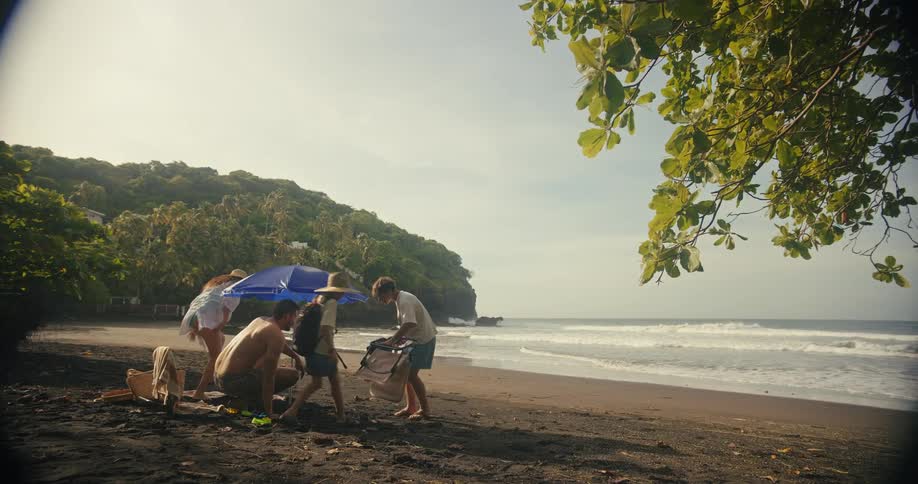 The family arrive on the beach