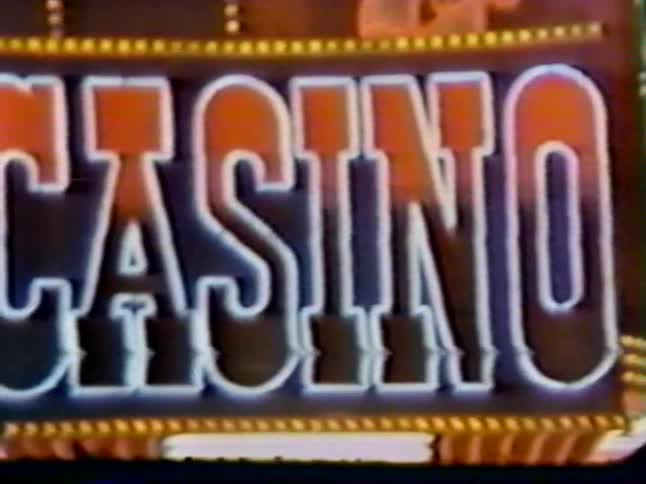 The sign is blinking and reads casino
