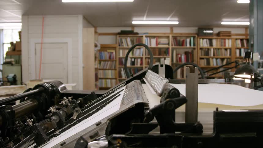 Close up of an operating printing machine in a library