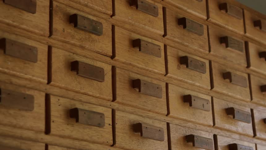 A cabinet with many drawers