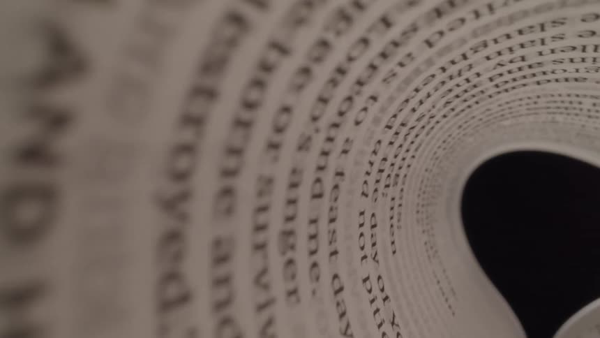 Going through a tunnel made of a book page