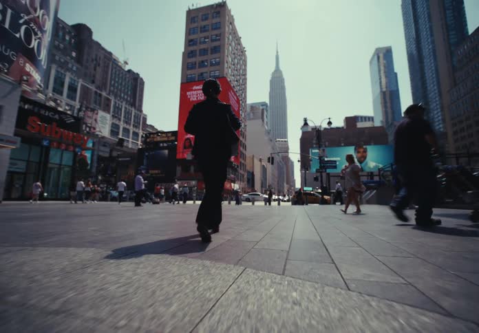 Many people walk through the big city