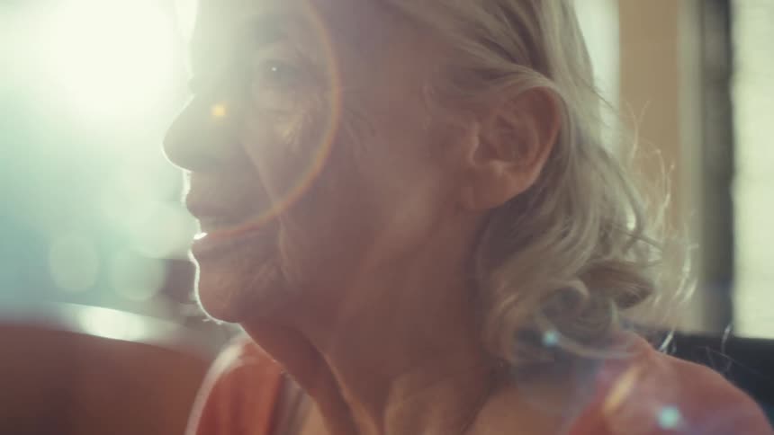 The woman sings into the microphone