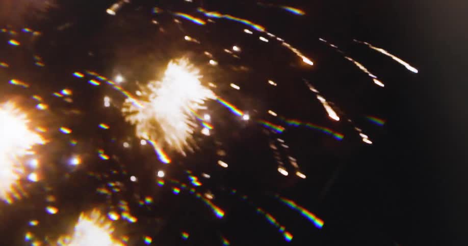 The fireworks fill the night sky