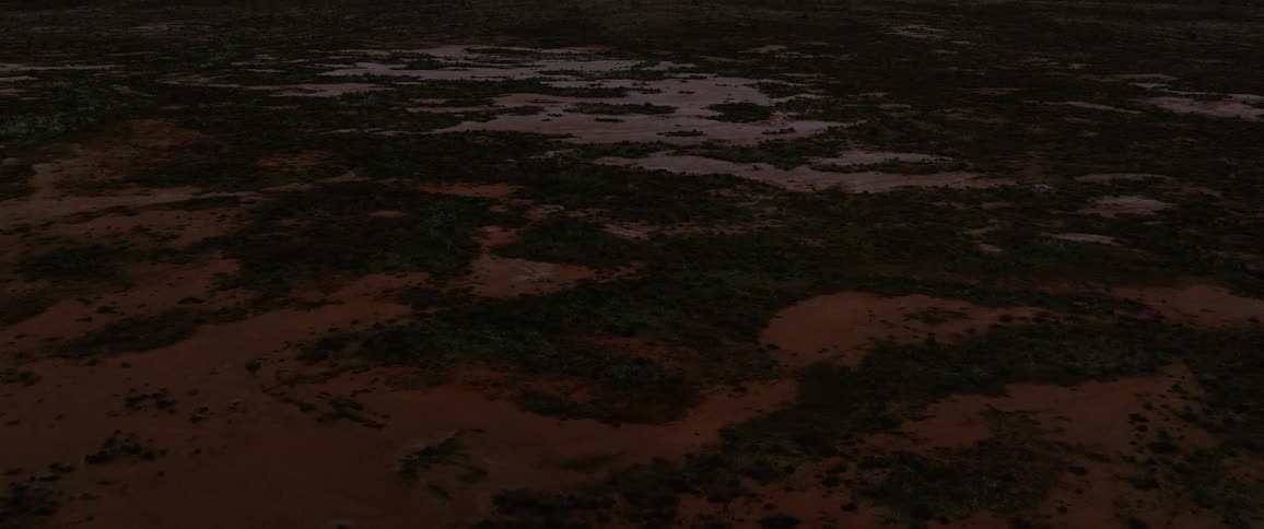 An birds eye view of a vast plain landscape and it is dusk time