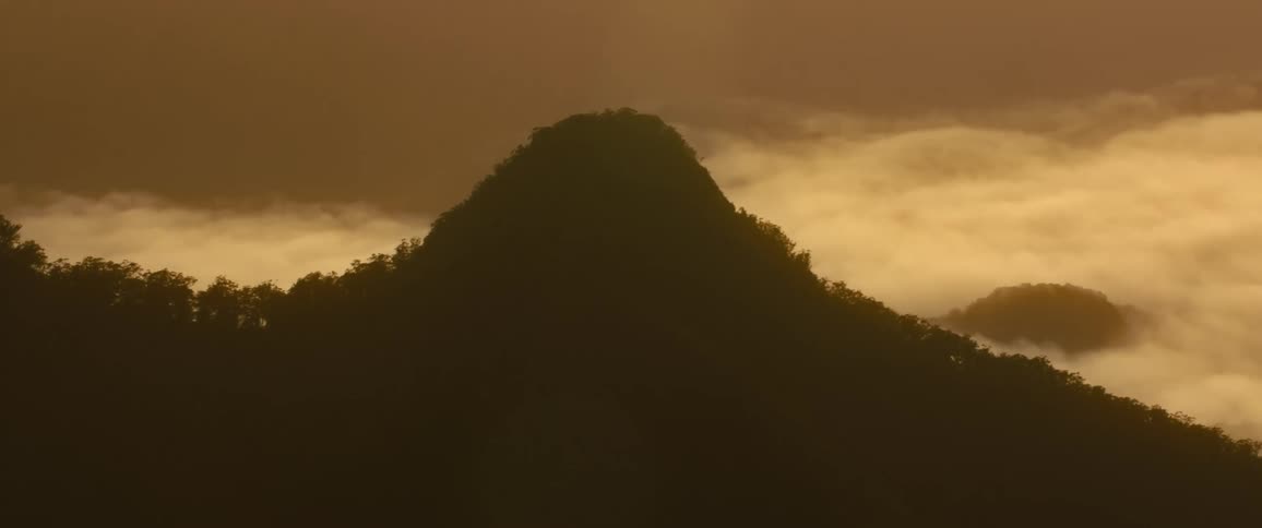 A vast beautiful view of a mountain range on dusk time