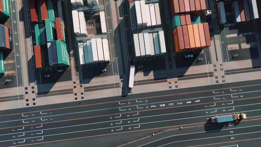 Cargo trucks are moving and transporting cargo from a port