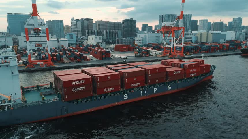 Ships with containers at the edge of a logistics port