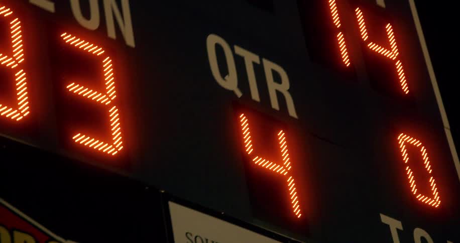 Score of a match appearing on a big screen