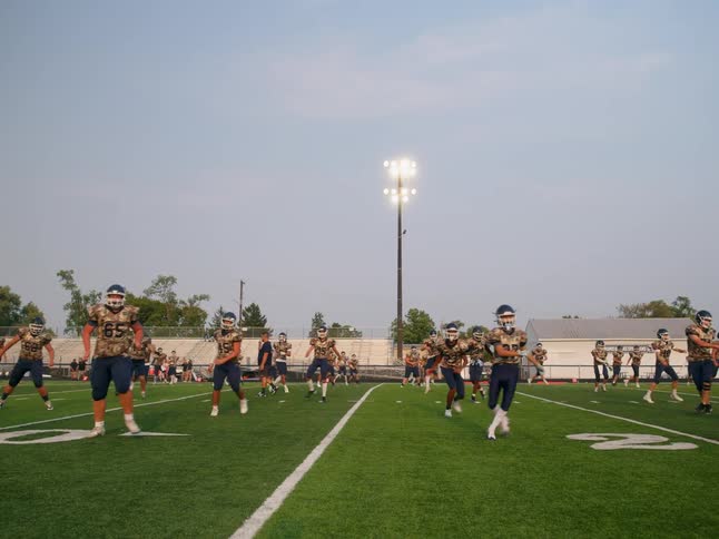 Football players practice