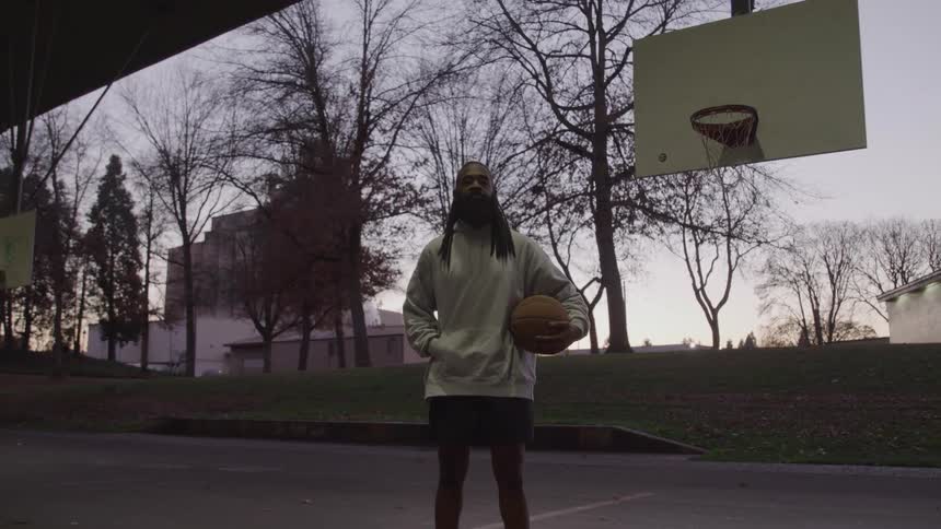 A man holding a basketball