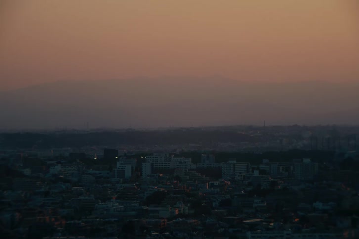 Dawn rises over a city