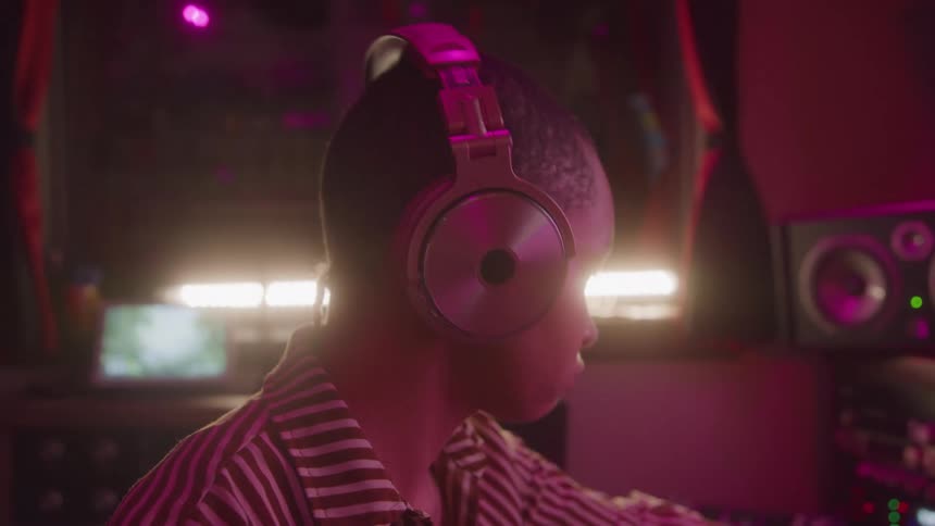 The man is in the studio making music