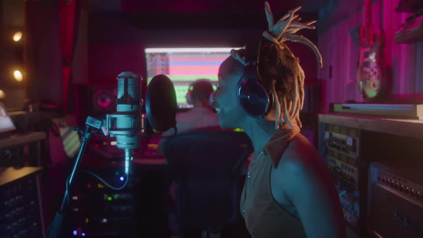 Singer singing in a music studio