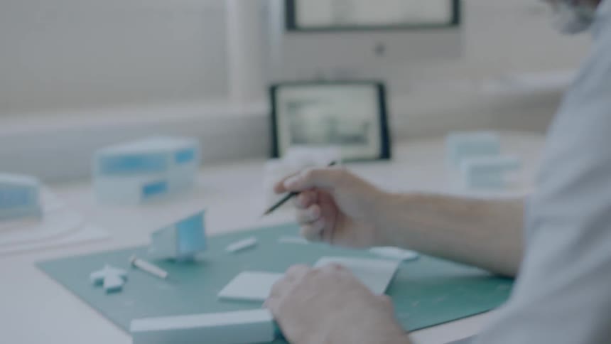 A man writes something down
