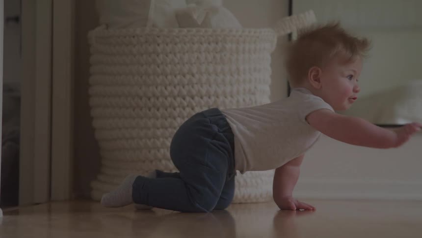 Blonde baby crawling
