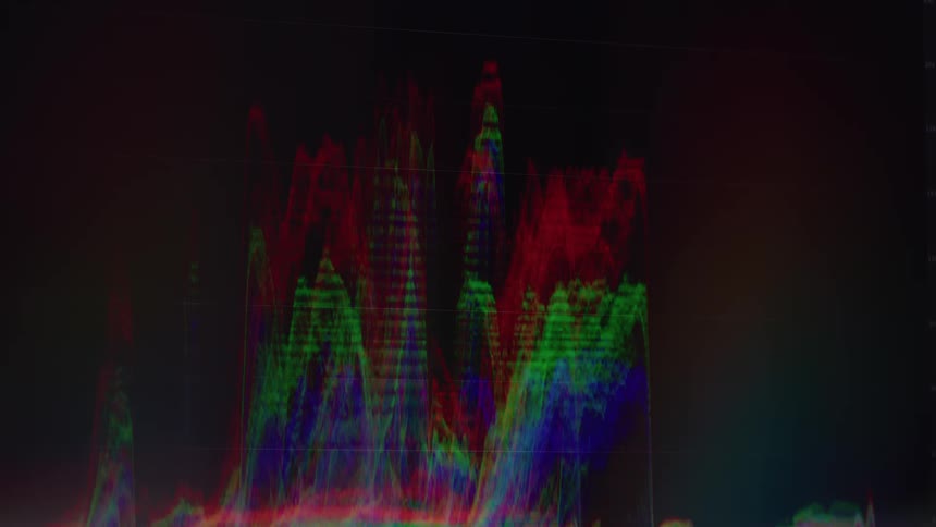 Colorful abstract wave of digital pattern and light against a dark background