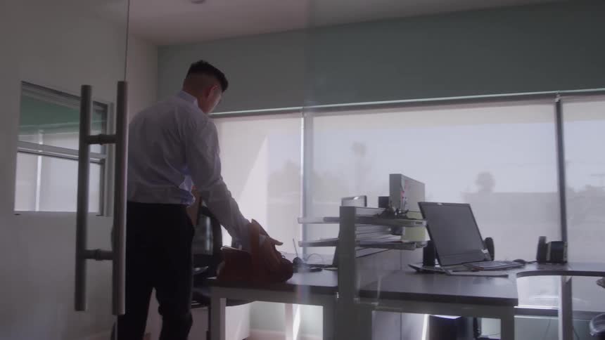 Man sitting at an office desk