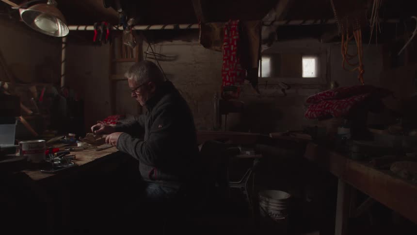 A man works in his workshop