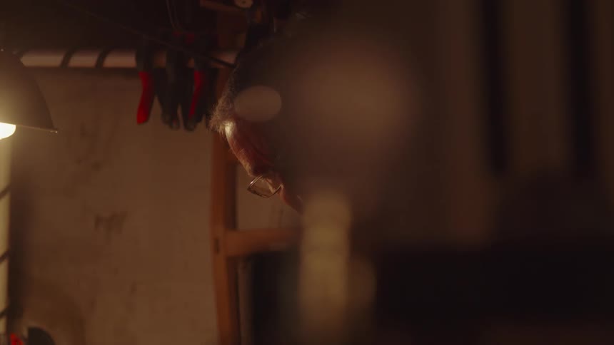 Man looking down in a room of the house