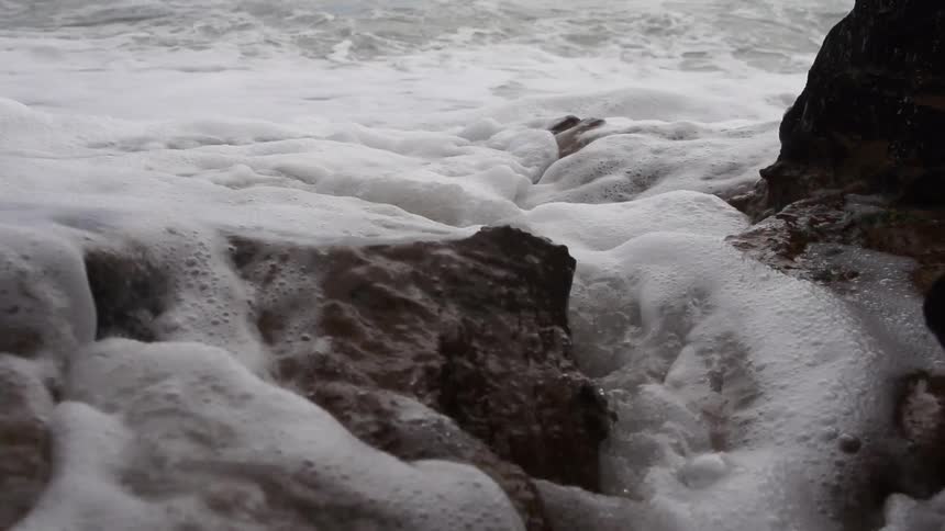 Waves crashing on some rocks