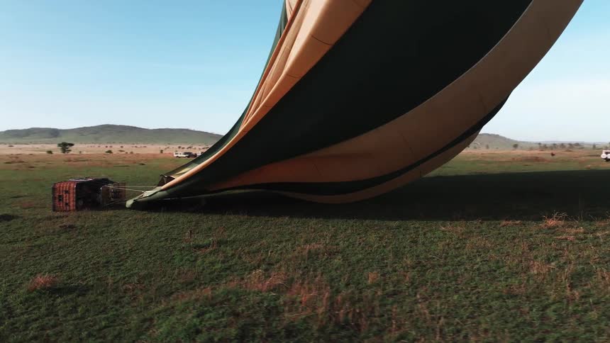The hot air balloon is deflating