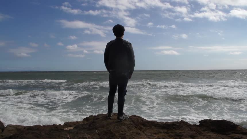 Man overlooking the ocean