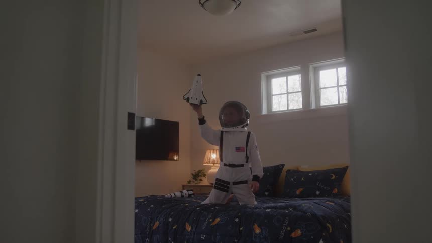 A child playing astronaut