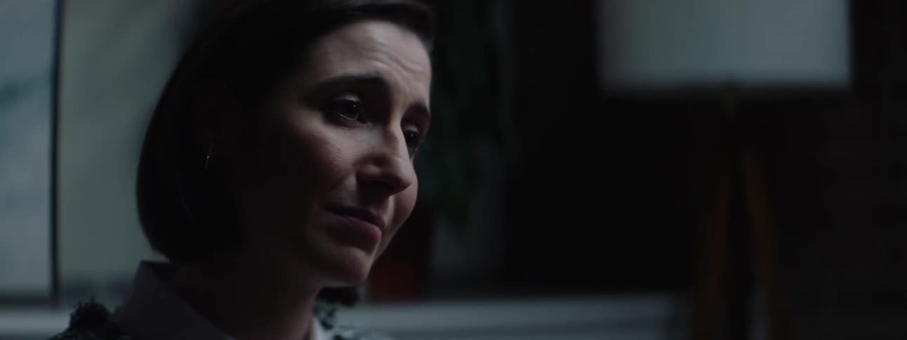 Close up portrait of an emotional young woman listening to another person speaking