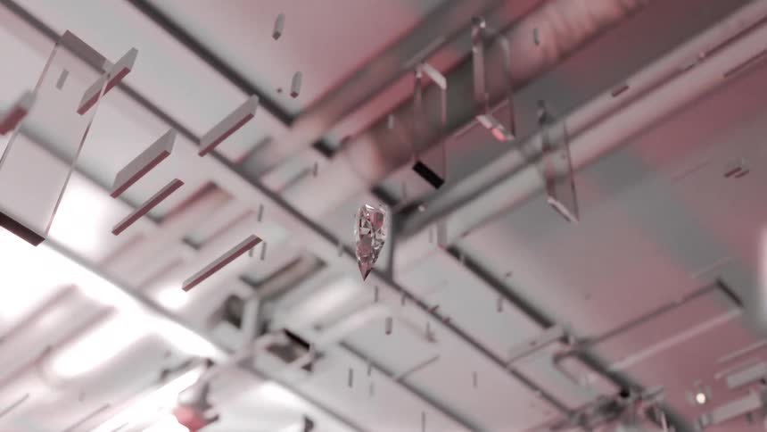 Metallic fragments suspended in an environment lit by pinkish light