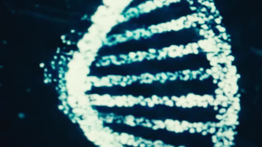 The monitor has a strand of dna spinning on it