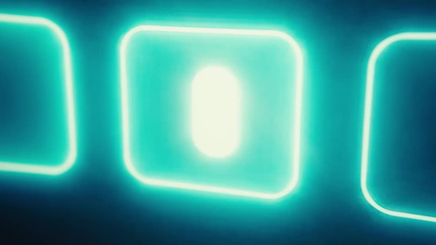 The computer monitor has an animation of a glowing dot moving