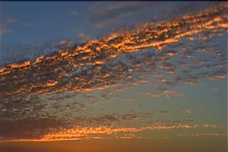 Clouds in the sky outdoors at sunset