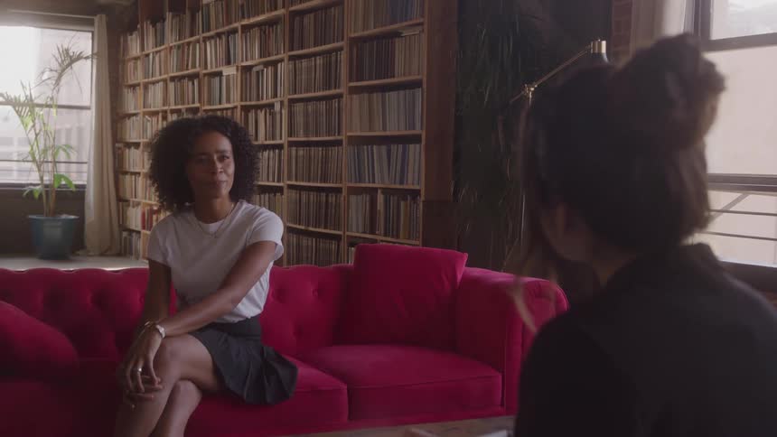 Two women talking in a room