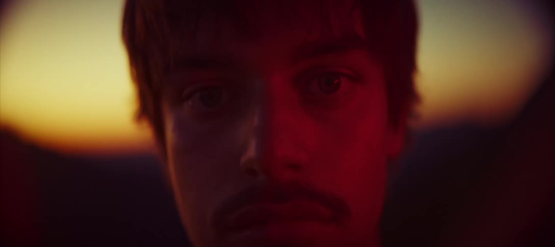 Light flashes on the mans face