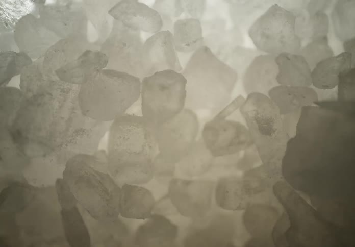 Translucent mineral crystals in light tones
