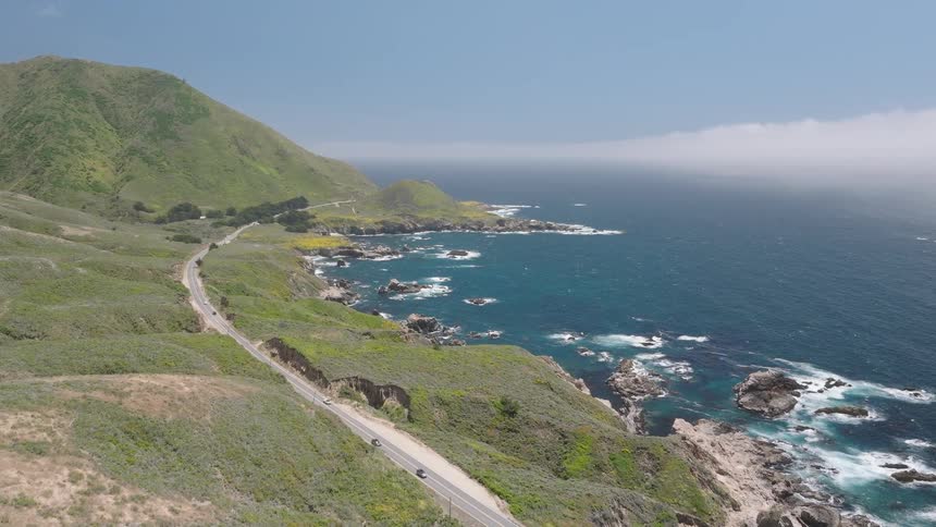 Highway on a green coast by the sea