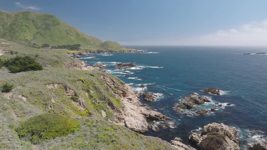 The coast line is lined with mountains