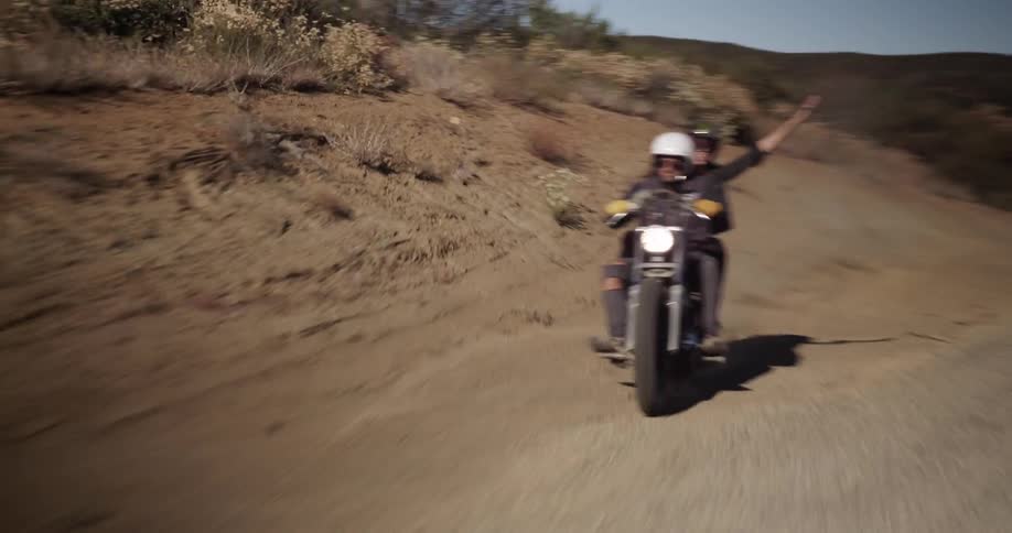 Motorcycle riding through dirt