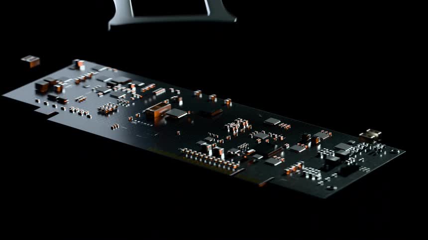 Electronic circuit board with components distributed over a dark surface